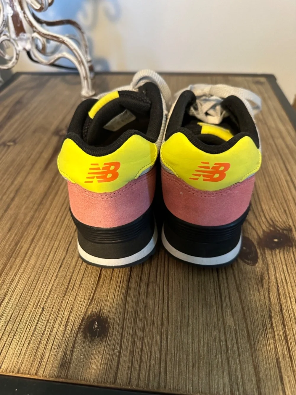 New Balance tennis shoes, gray with yellow and black trim, pink suede, size 7.5
